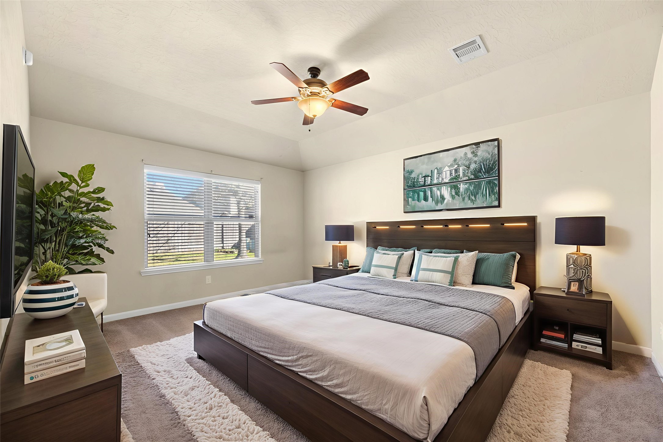 3311 Sabine Spring Lane Katy, TX 77449 - Photo 6 of 16 The Primary Suite offers a serene retreat with soft new carpet, a large window overlooking the backyard and and convenient direct access to your private en-suite bath. Virtually staged.