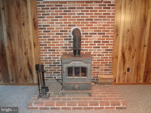 143 East Red Hill Road Conowingo, MD 21918 - Photo 21 of 23 Wood Burning Stove in Family Room