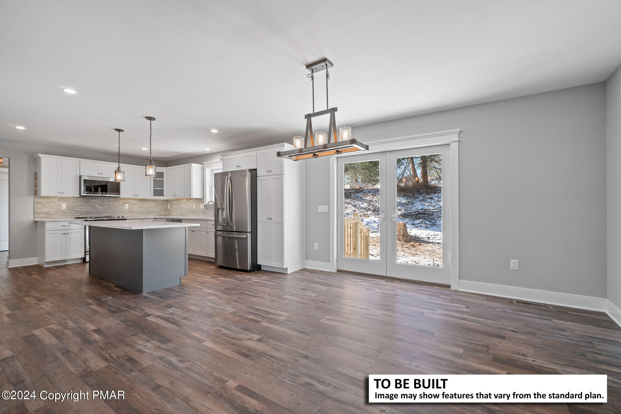 a view of a kitchen with a sink wooden cabinets and window