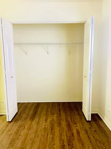 a view of small space with wooden floor