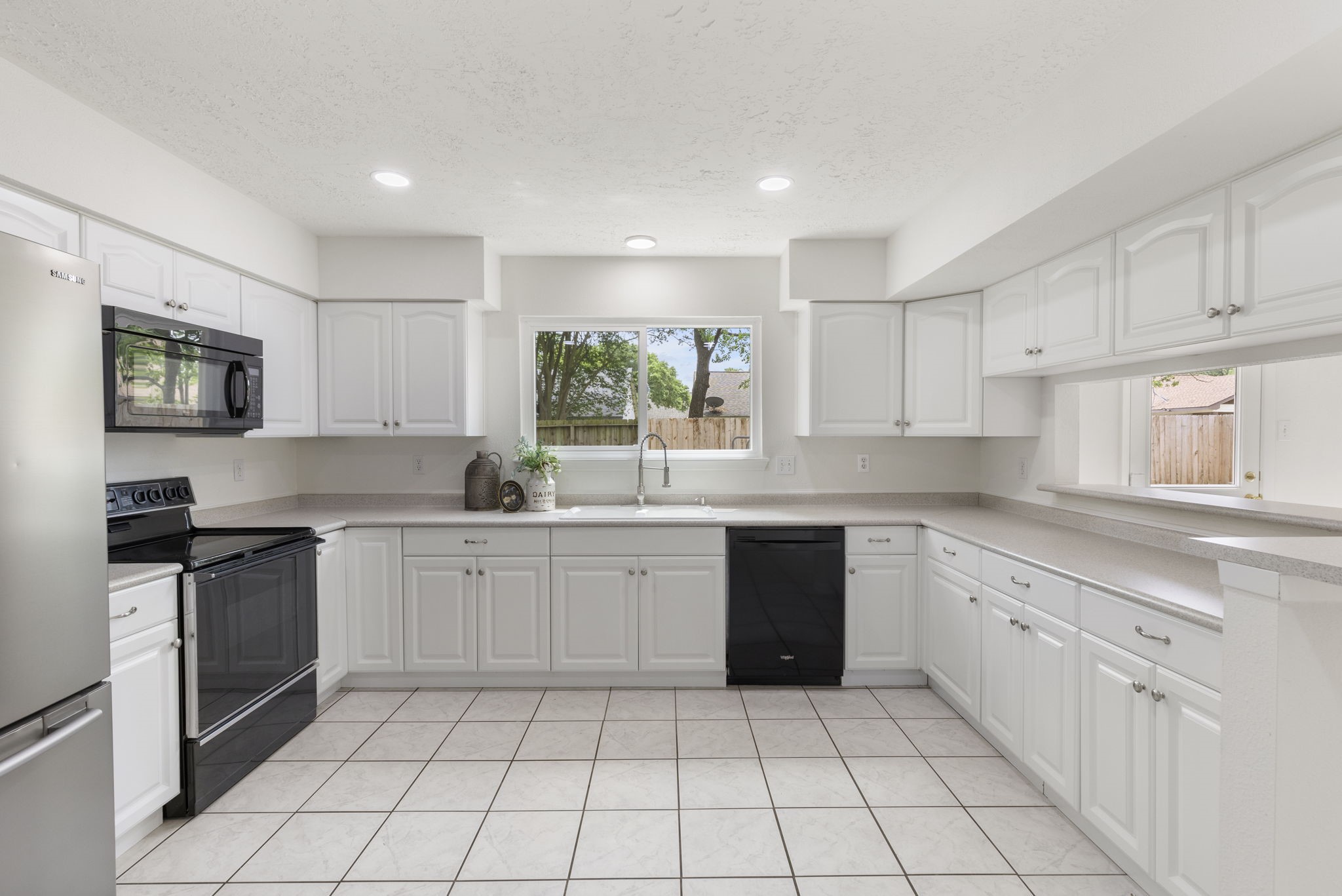 4715 Towermont Lane Spring, TX 77388 - Photo 11 of 35 The chef of the home will love having all of this counter and cabinet space at their disposal.