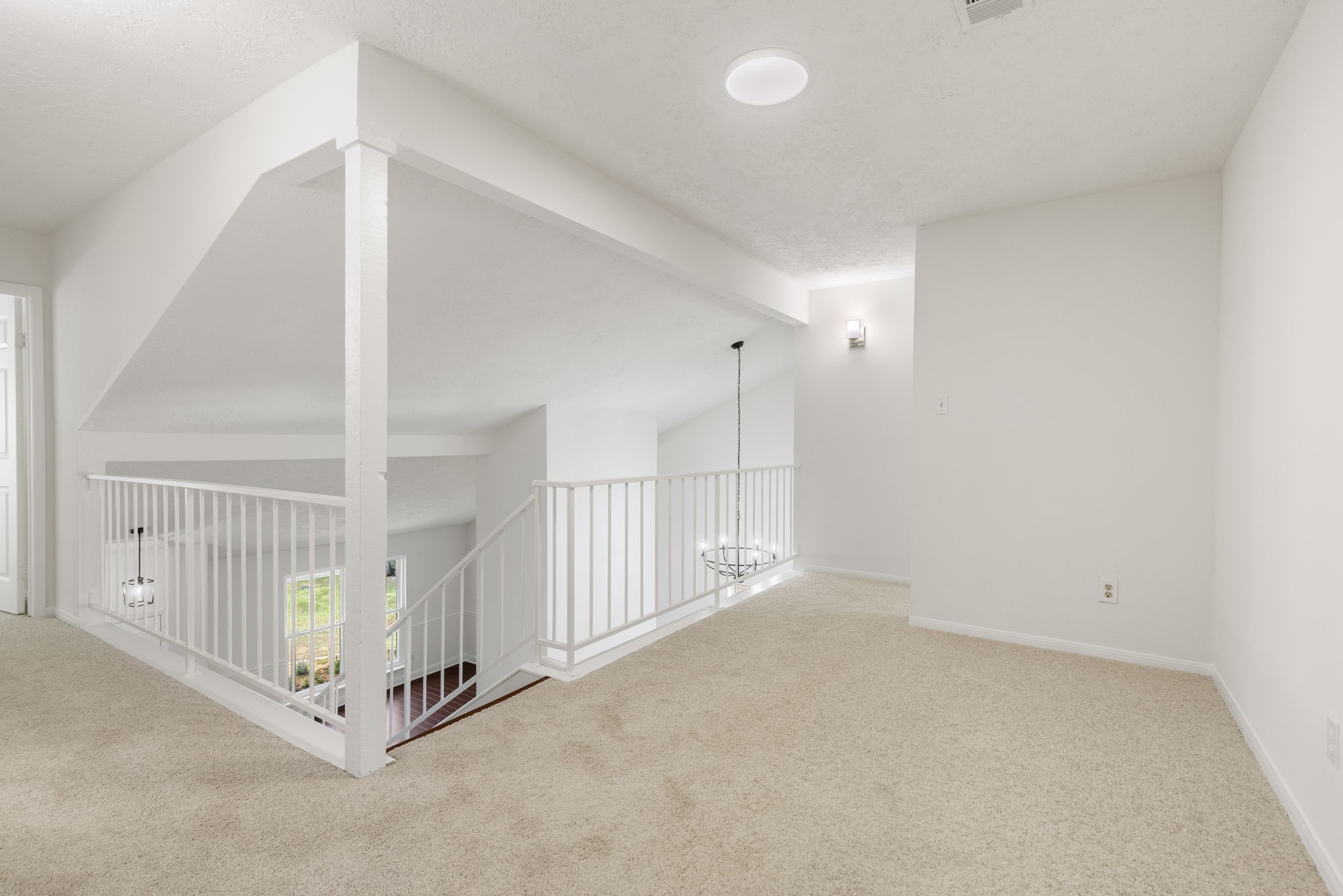 4715 Towermont Lane Spring, TX 77388 - Photo 14 of 35 The upstairs greets you with brand new carpet and fresh paint.