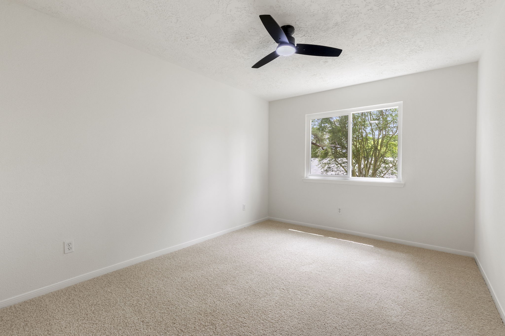 4715 Towermont Lane Spring, TX 77388 - Photo 20 of 35 3rd bedroom upstairs with all new upgrades as the other rooms.