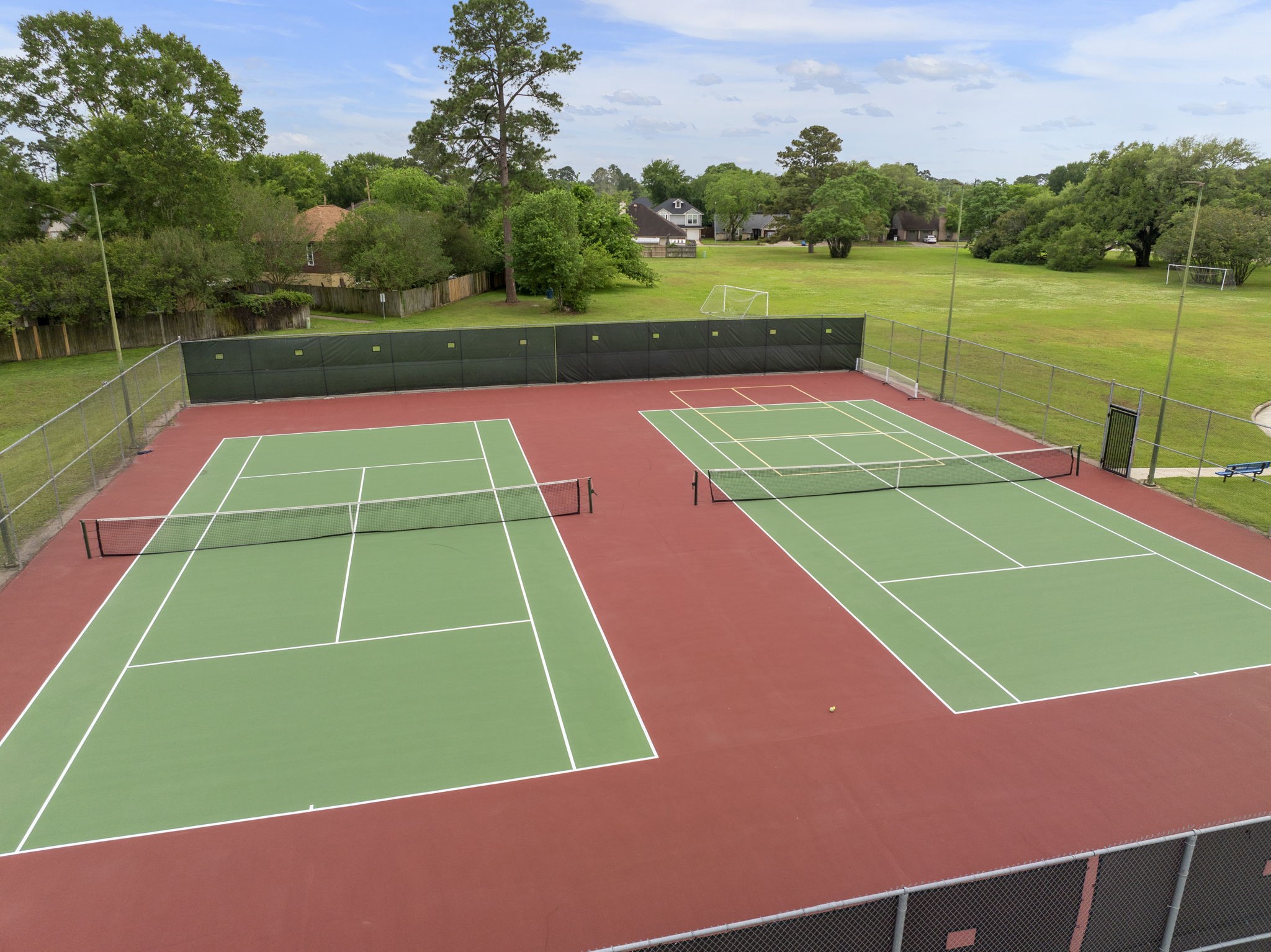 4715 Towermont Lane Spring, TX 77388 - Photo 28 of 35 Tennis courts and large green spaces for ultimate outdoor play.