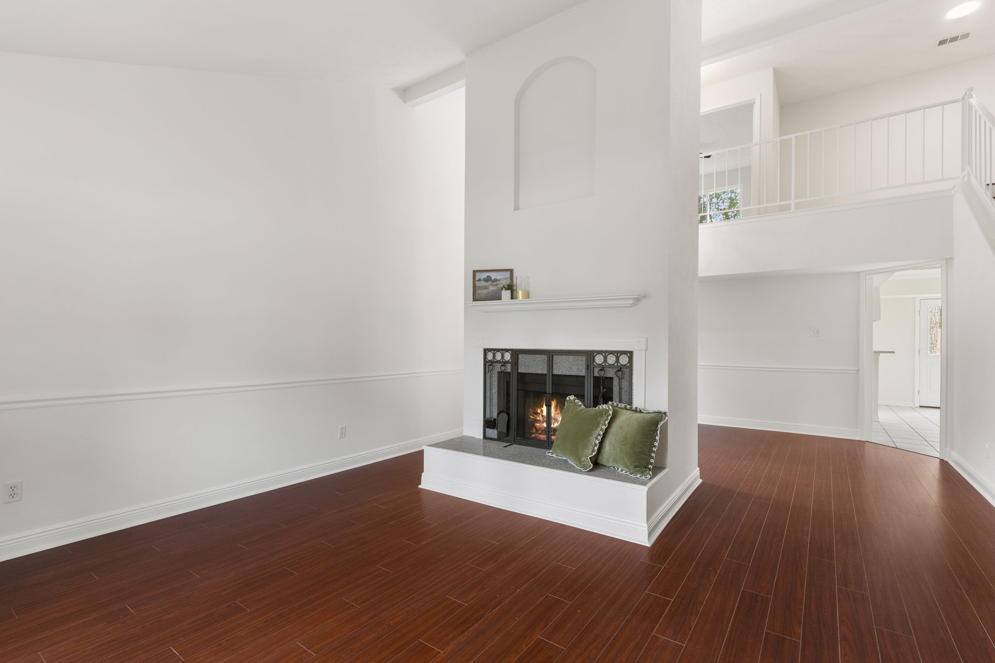 4715 Towermont Lane Spring, TX 77388 - Photo 4 of 35 Soaring, vaulted ceilings, fresh paint and warming fireplace make this home feel warm and inviting from the moment you step inside.