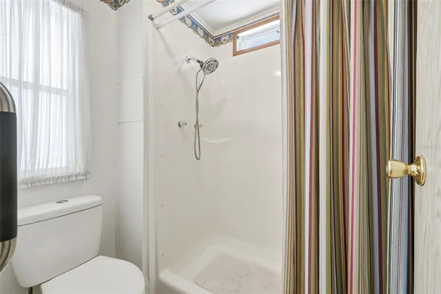 a bedroom with a bed and a closet