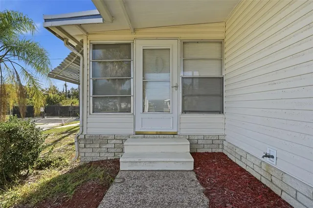 en empty room with windows