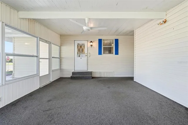 an empty room with window