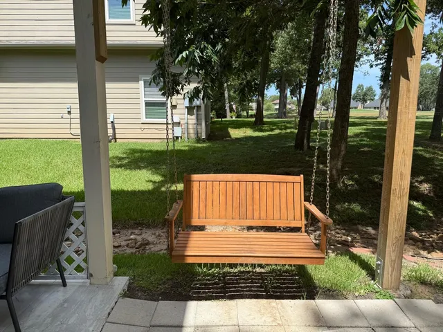 a view of backyard with green space