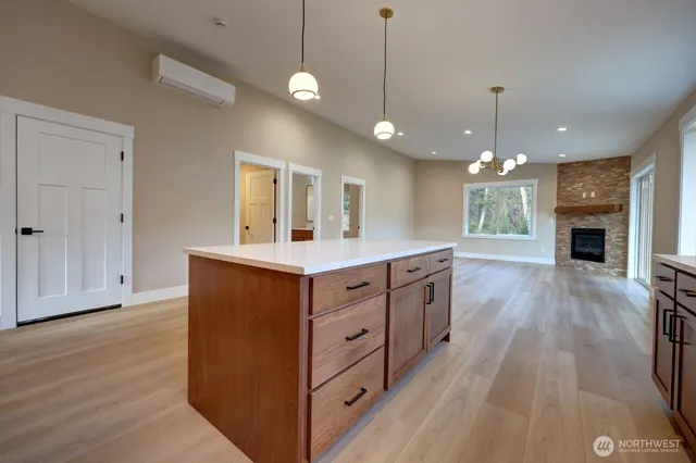 a spacious bathroom with a double vanity sink and a mirror