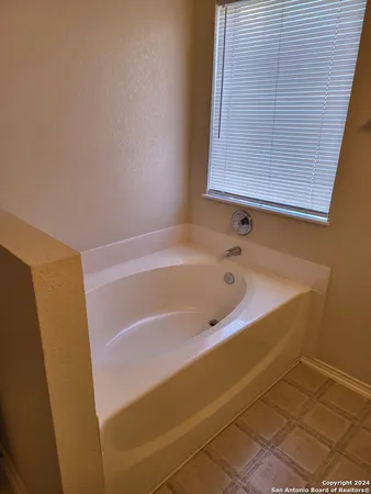 a bathroom with a bathtub