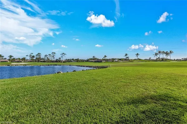 a view of a golf course with a swimming pool