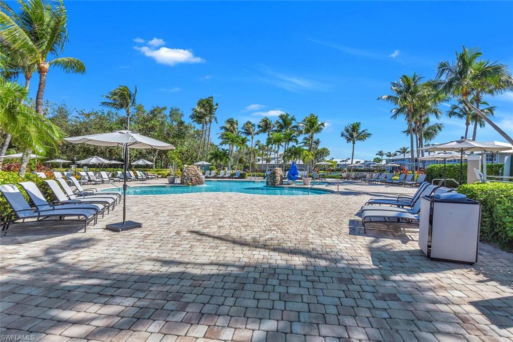 7895 Mahogany Run Lane, Unit 1416 Naples, FL 34113 - Photo 32 of 38 a view of a yard with an outdoor space
