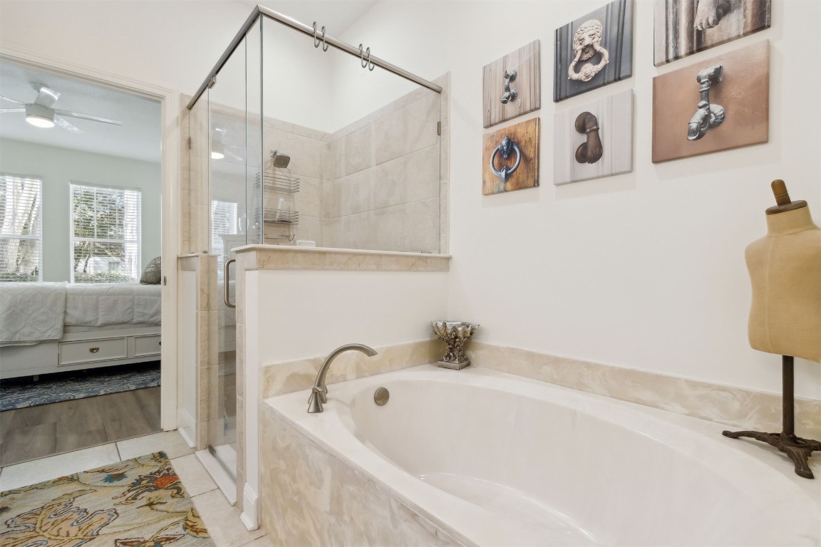 1824 Perimeter Park Road West Fernandina Beach, FL 32034 - Photo 12 of 24 a bathroom with a tub a sink and a shower