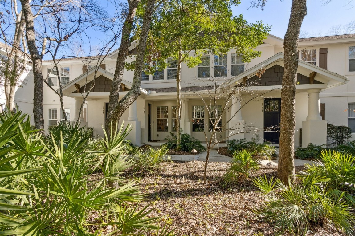 1824 Perimeter Park Road West Fernandina Beach, FL 32034 - Photo 2 of 24 front view of a house with a small yard