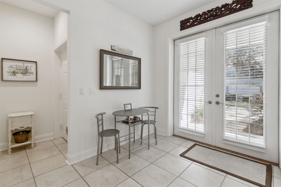 1824 Perimeter Park Road West Fernandina Beach, FL 32034 - Photo 9 of 24 a dining room with furniture and a window