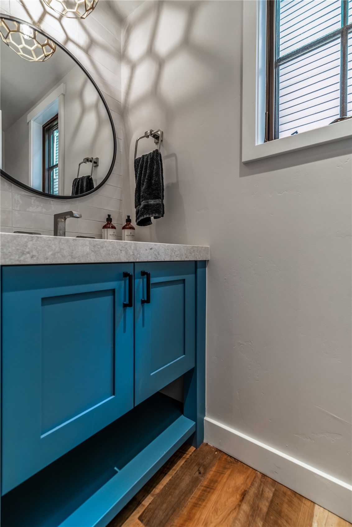 208 North Ridge Street Breckenridge, CO 80424 - Photo 13 of 35 a bathroom with a sink and a mirror