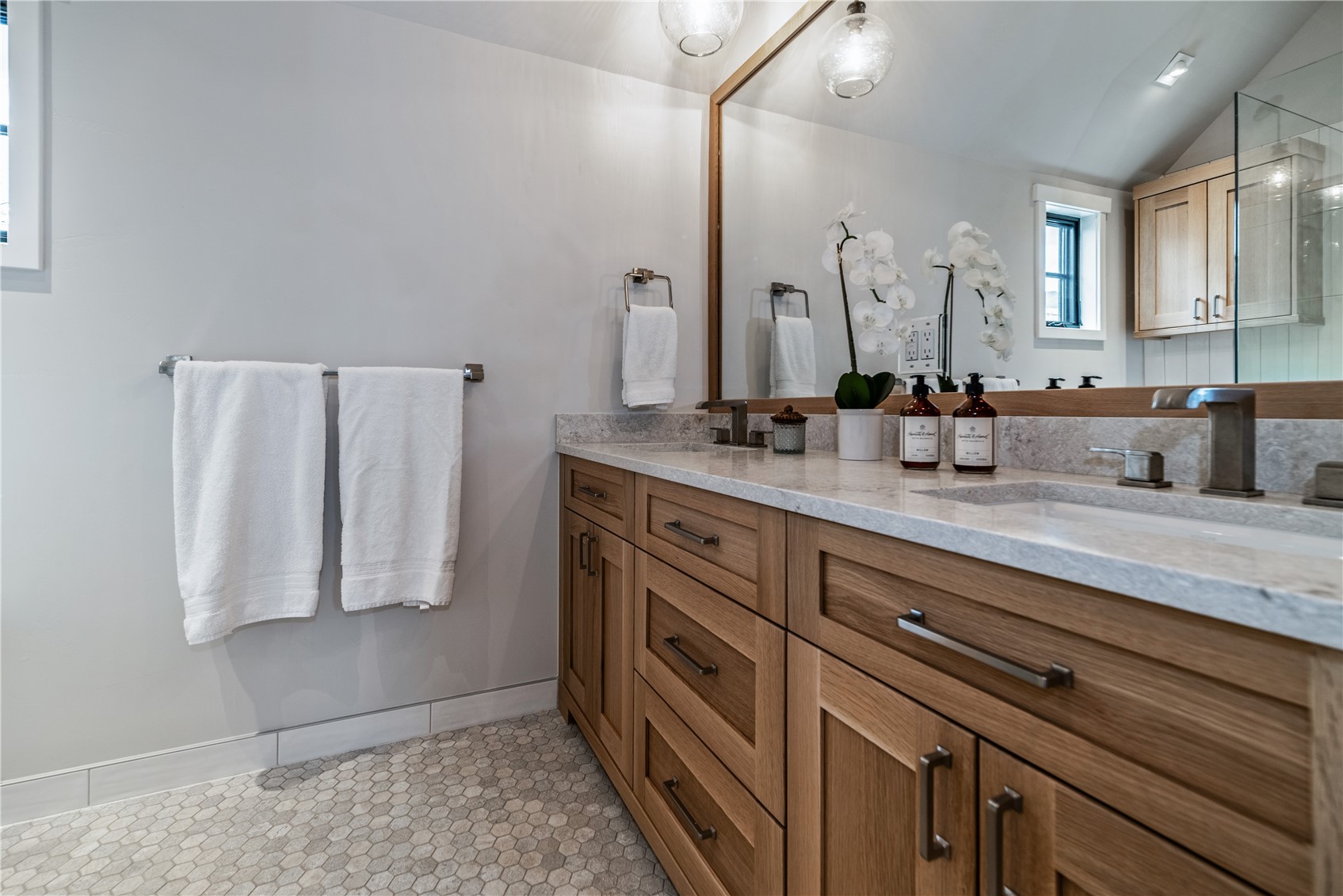 208 North Ridge Street Breckenridge, CO 80424 - Photo 15 of 35 a bathroom with a sink and a mirror
