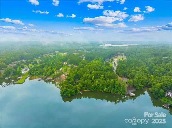 a view of a lake with a yard