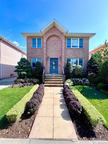 a view of a house with a garden