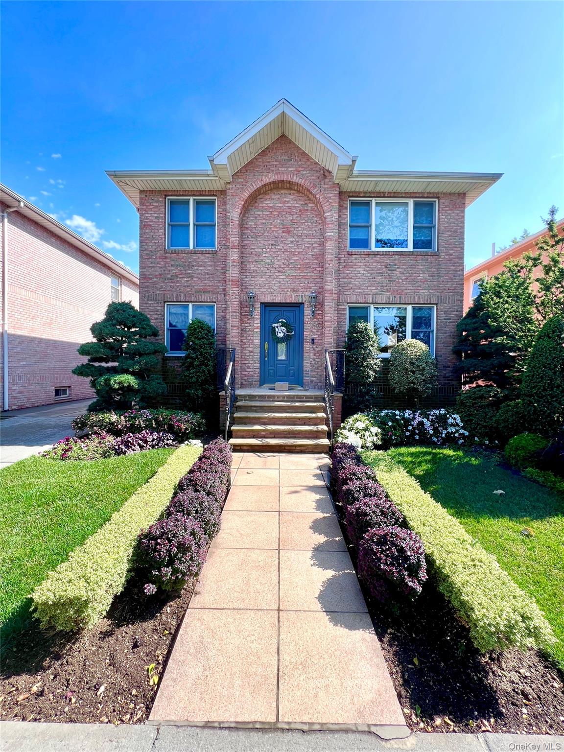 157-24 20th Road Queens, NY 11357 - Photo 1 of 1 a view of a house with a garden