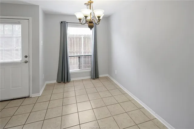 a view of an empty room with window