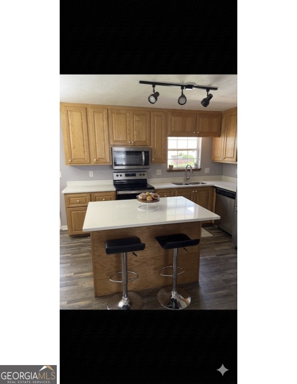 725 Strickland Town Road Luthersville, GA 30251 - Photo 2 of 18 a kitchen with a sink and cabinets