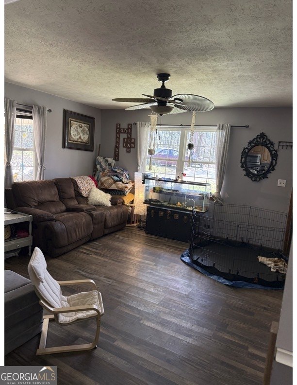 725 Strickland Town Road Luthersville, GA 30251 - Photo 8 of 18 a living room with furniture and wooden floor