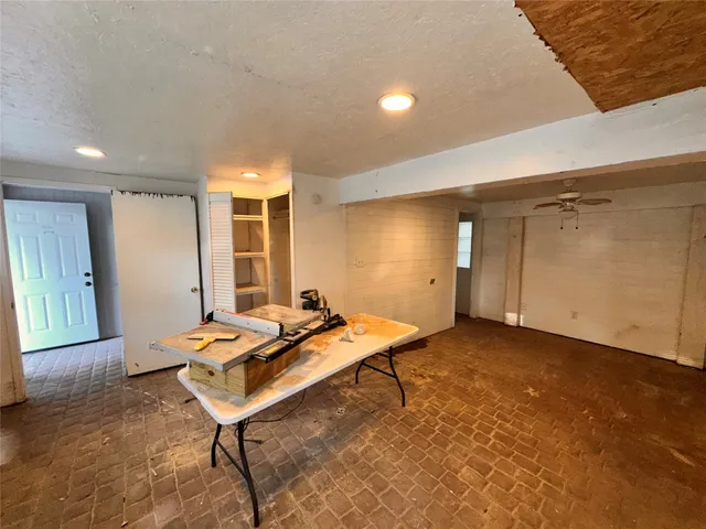 a room with furniture and window