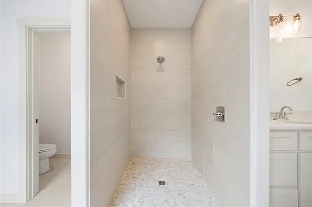 a bathroom with a sink and toilet