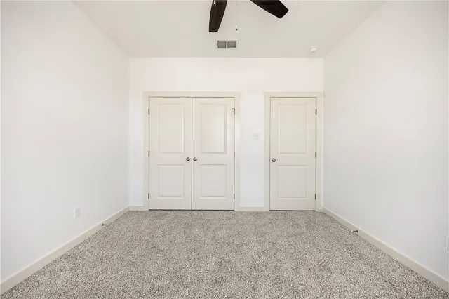 an empty room with cabinet