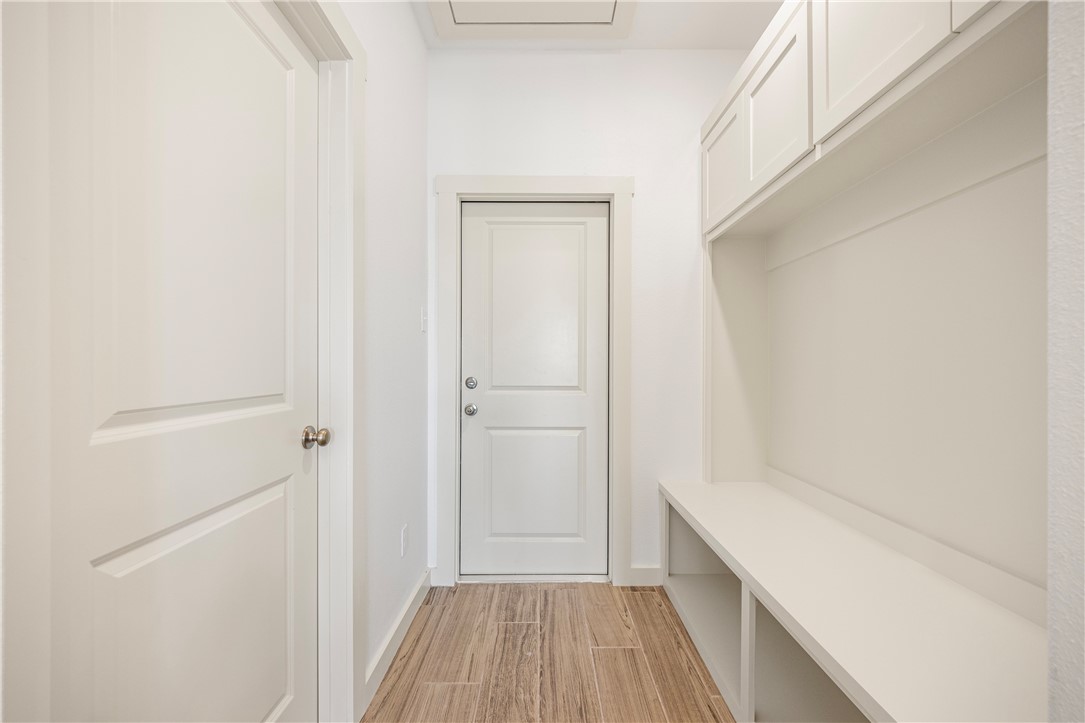 1702 Elm View Drive Corpus Christi, TX 78418 - Photo 26 of 27 a view of a bathroom with a hardwood