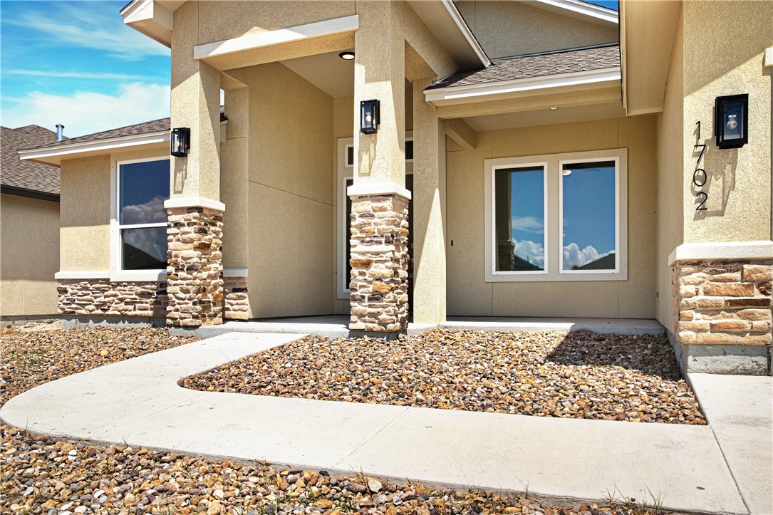 1702 Elm View Drive Corpus Christi, TX 78418 - Photo 3 of 27 a view of a entryway door of the house