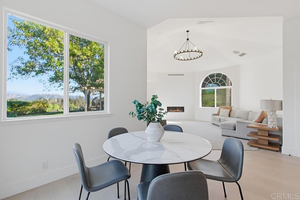 2241 Via Corto Fallbrook, CA 92028 - Photo 26 of 66 a view of a dining room with furniture window and outside view