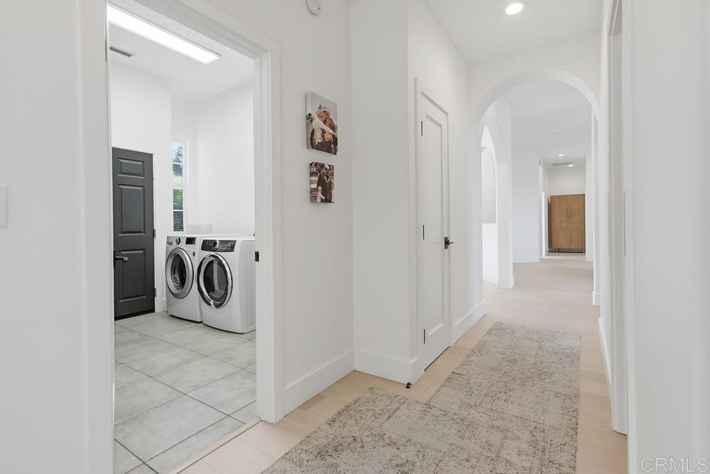 2241 Via Corto Fallbrook, CA 92028 - Photo 28 of 66 a view of a storage & utility room with a washer dryer