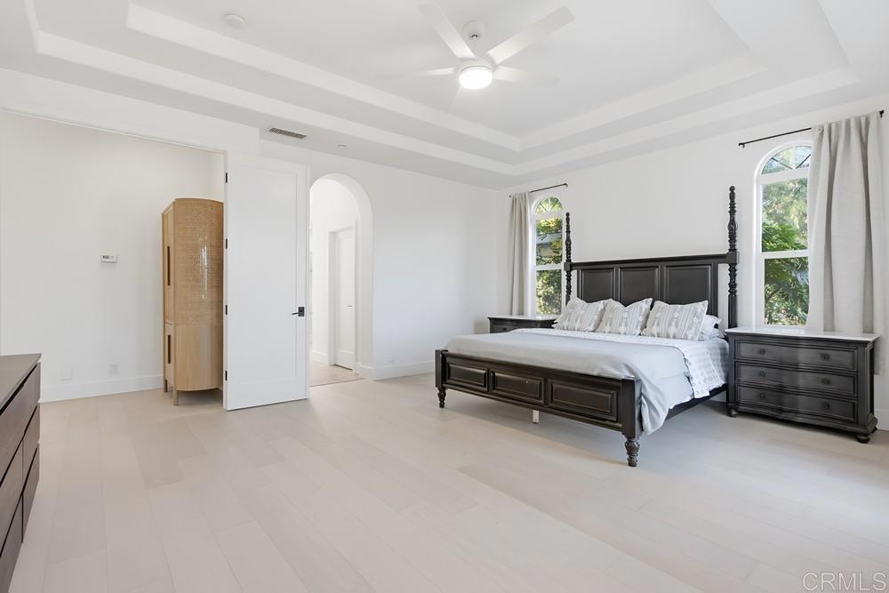 2241 Via Corto Fallbrook, CA 92028 - Photo 37 of 66 a bedroom with a bed dresser and a window