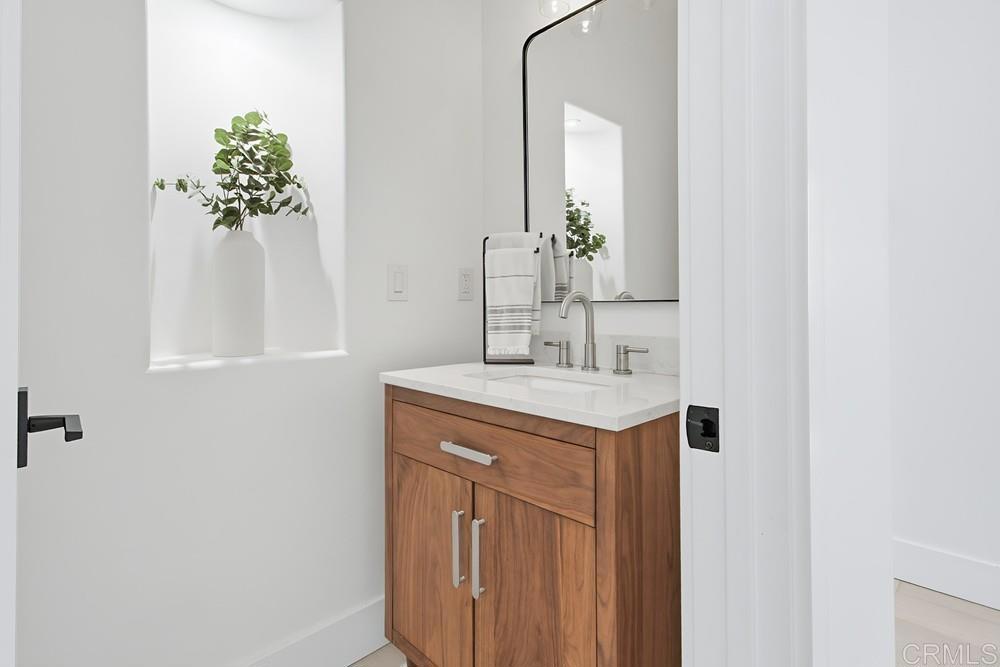 2241 Via Corto Fallbrook, CA 92028 - Photo 41 of 66 a bathroom with a sink and a mirror