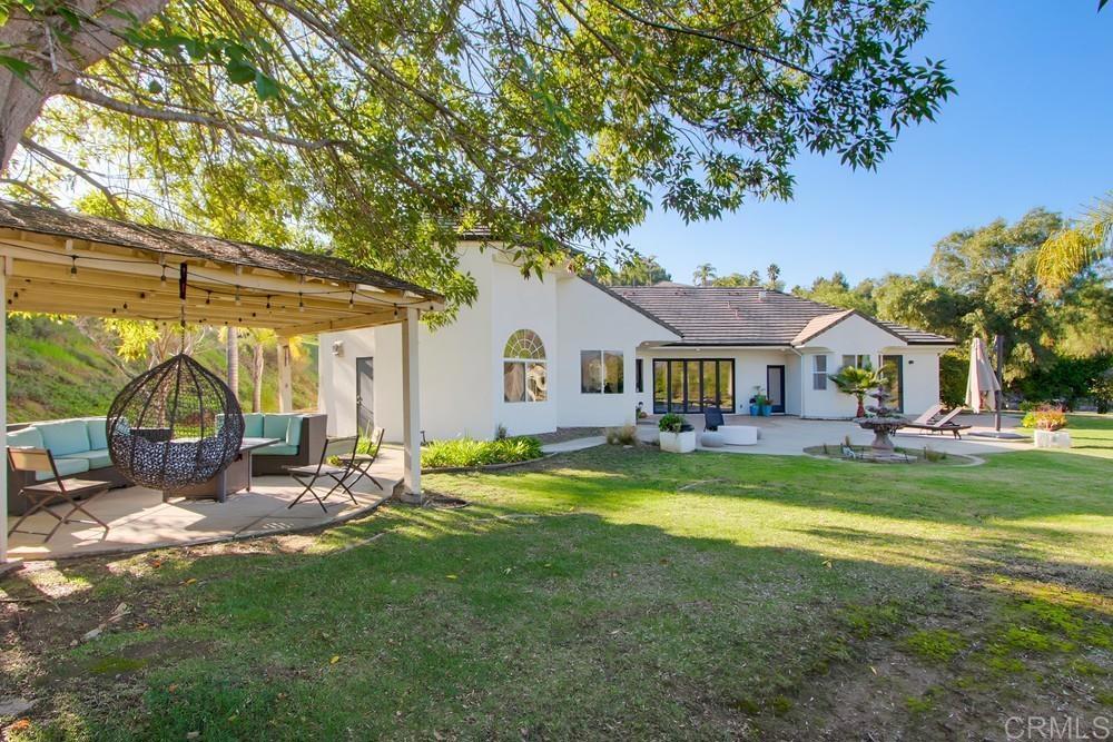 2241 Via Corto Fallbrook, CA 92028 - Photo 53 of 66 a view of a house with backyard and sitting area