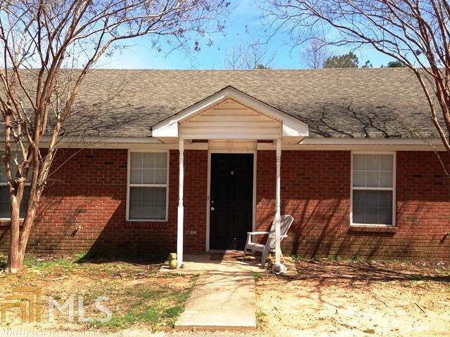 a view of a house with snow on the wall