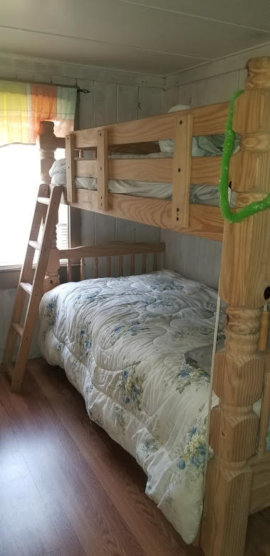 262 Old Wharf Road, Unit 67 Dennis Port, MA 02639 - Photo 12 of 28 a bedroom with a bed and a window