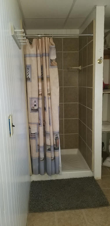 262 Old Wharf Road, Unit 67 Dennis Port, MA 02639 - Photo 14 of 28 a bathroom with a shower