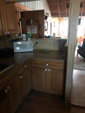 262 Old Wharf Road, Unit 67 Dennis Port, MA 02639 - Photo 5 of 28 a kitchen with a sink and a window
