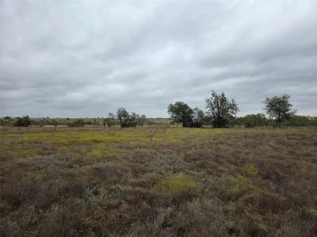 a view of lake with green space