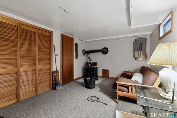 a room with furniture and a chandelier