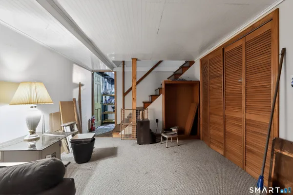 a bedroom with furniture