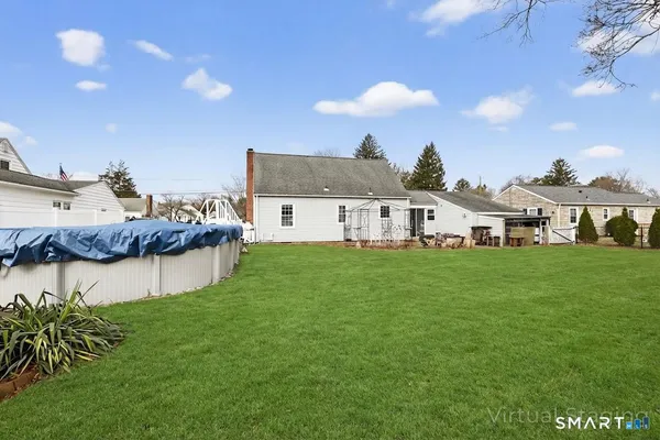 a view of a house with a big yard