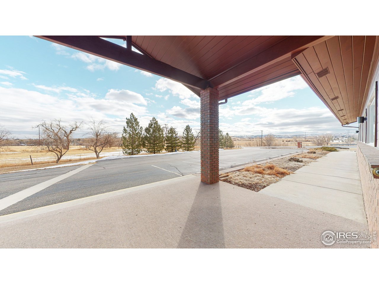 6783 Baseline Road Boulder, CO 80303 - Photo 3 of 40 Covered Porch and Ramp - views to the SE