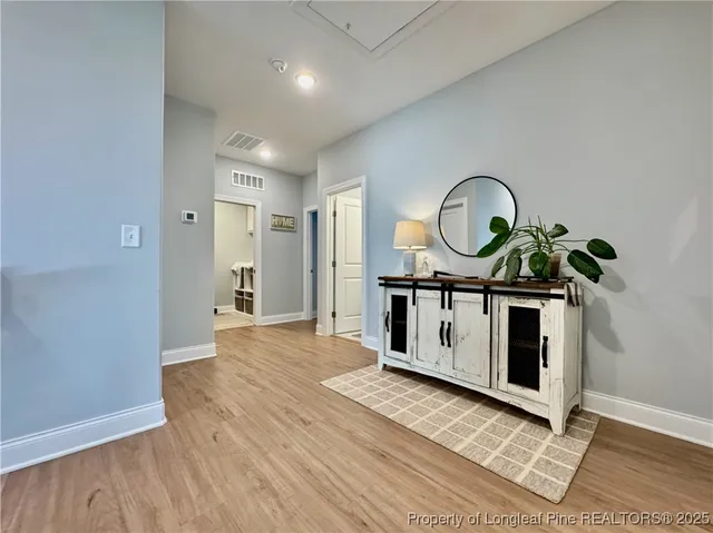 a bedroom with bed and window