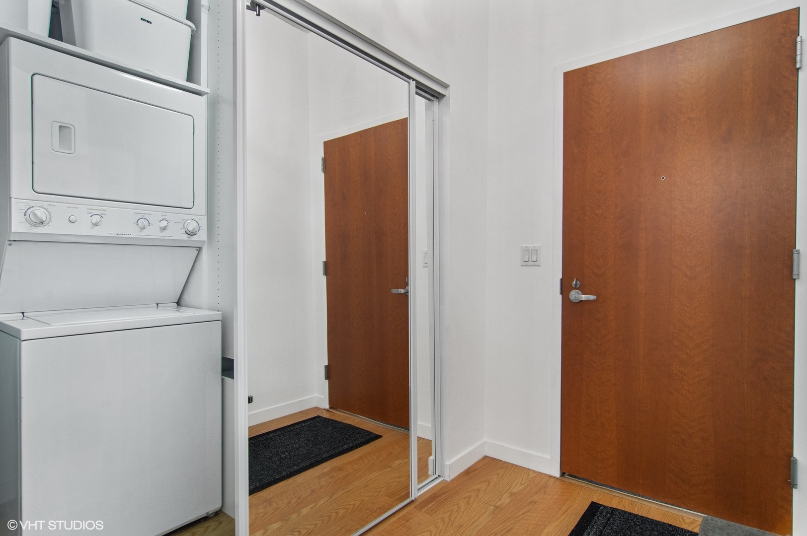 235 West Van Buren Street, Unit 1815 Chicago, IL 60607 - Photo 12 of 17 a view of bathroom with washer and dryer