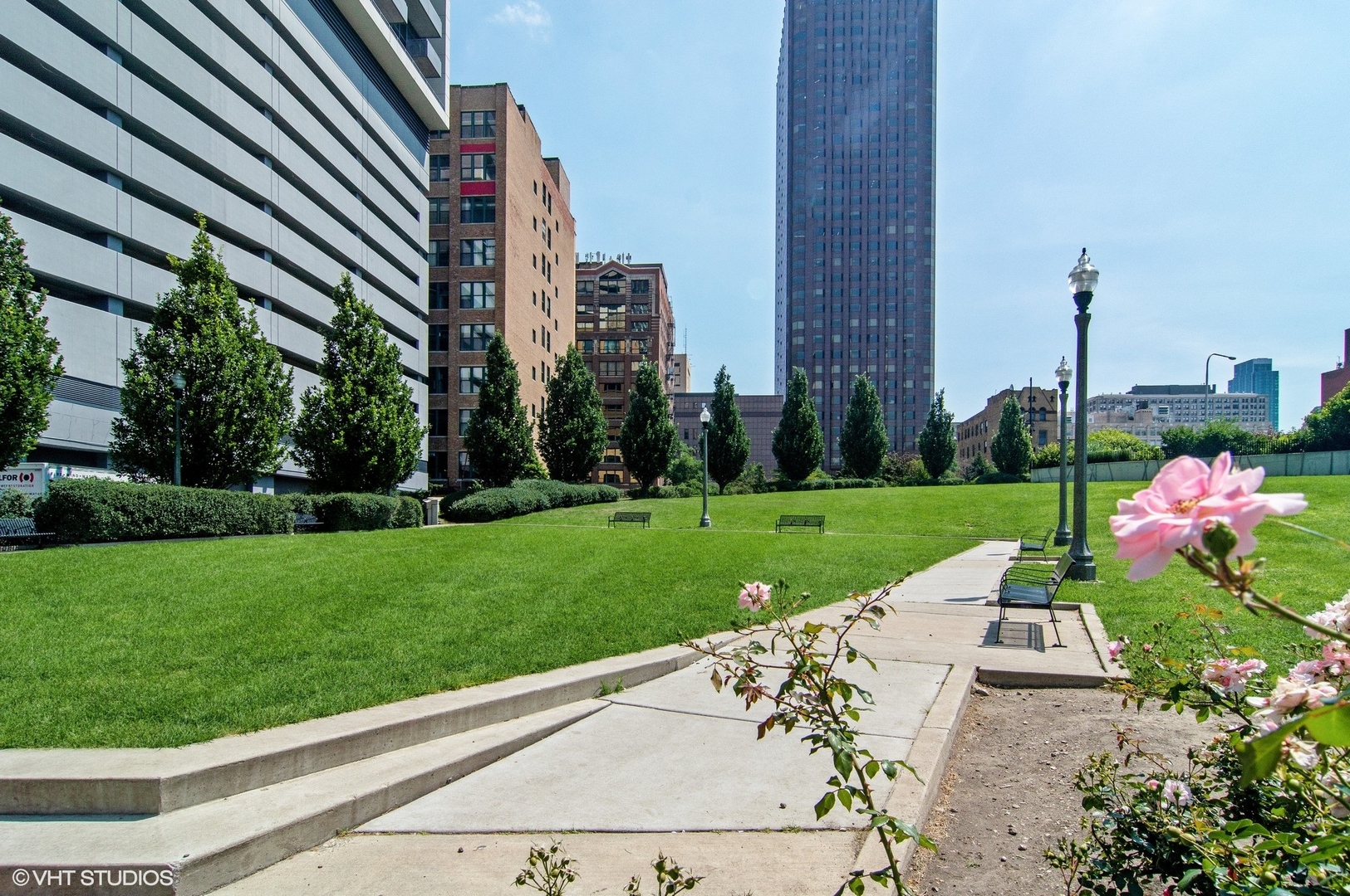 235 West Van Buren Street, Unit 1815 Chicago, IL 60607 - Photo 15 of 17 a view of a garden with a bench in the garden
